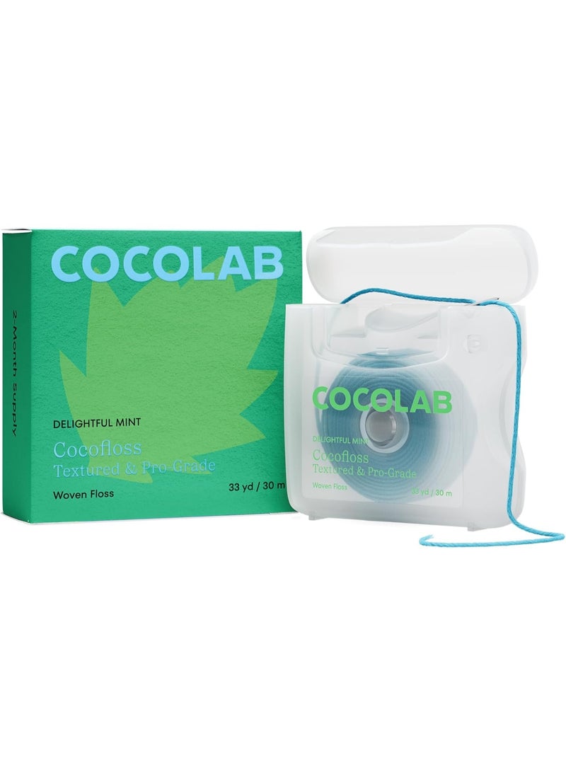 Cocofloss Woven Dental Floss, Dentist-Designed Oral Care, Mint, Waxed, Expanding, Vegan, Kid-Friendly String Floss with Coconut Oil, 1 Spool (33 yd) - Image 1