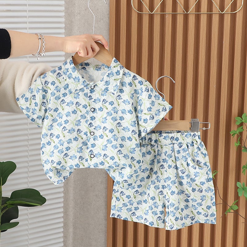 Foreign trade new summer boys shirt full-body printed short sleeve casual cotton pants two-piece set manufacturers wholesale light blue