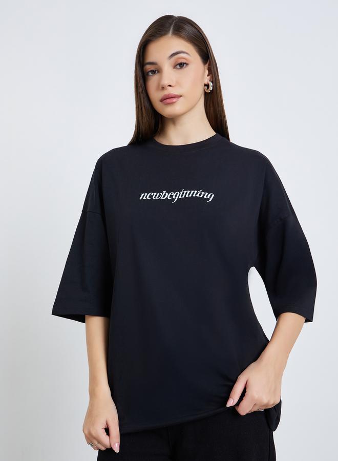 Styli Women Black Oversized Slogan T-Shirt - Image 1