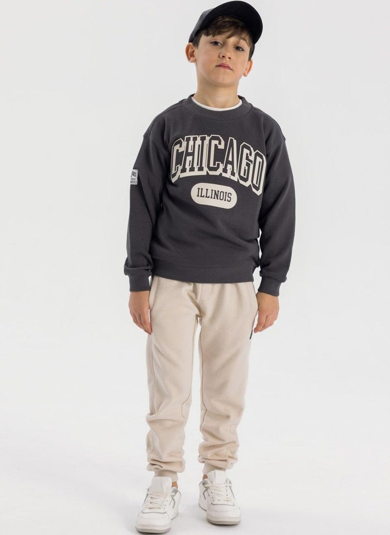 MINOTI Kids Jogger Trousers With Patch Detail - Image 1