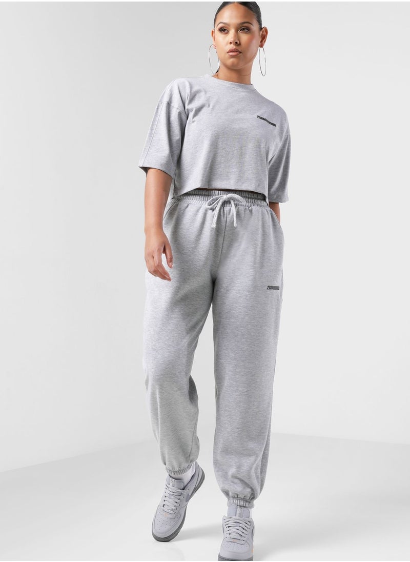 The Giving Movement - Oversized Racer Printed Joggers - Image 1