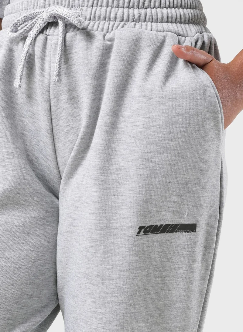 The Giving Movement Oversized Racer Printed Joggers