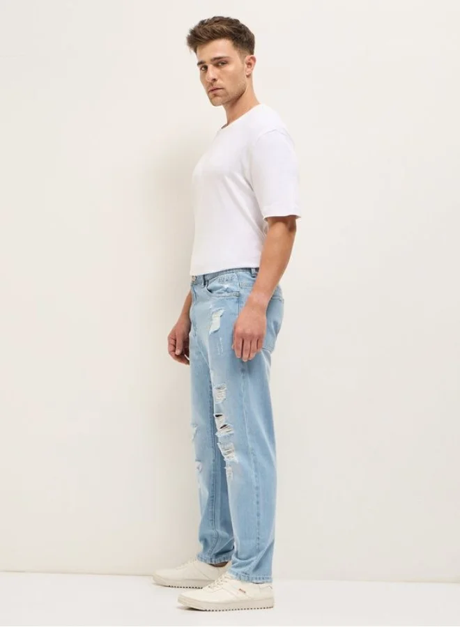THE BEAR HOUSE  Men's Light Blue with Light Fade High Distressed Mid-Rise Relaxed Fit Jeans Classic Comfort With Modern Style, Perfect For Everyday Casual Looks And Effortless Streetwear Vibes for Men | Best Price UAE
