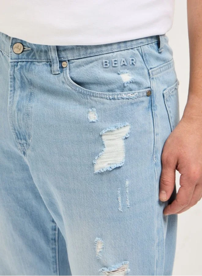 THE BEAR HOUSE  Men's Light Blue with Light Fade High Distressed Mid-Rise Relaxed Fit Jeans Classic Comfort With Modern Style, Perfect For Everyday Casual Looks And Effortless Streetwear Vibes for Men | Best Price UAE