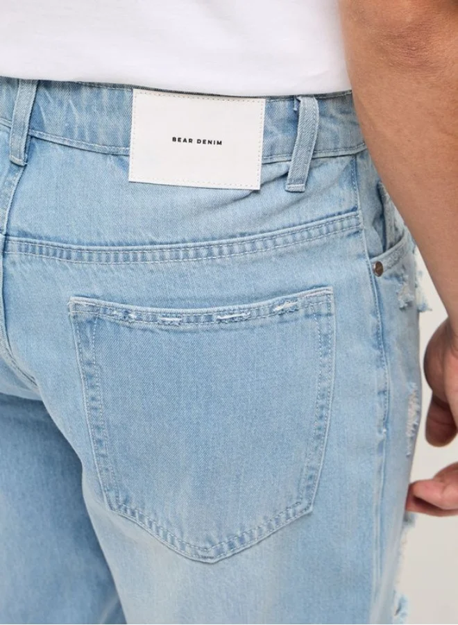 THE BEAR HOUSE  Men's Light Blue with Light Fade High Distressed Mid-Rise Relaxed Fit Jeans Classic Comfort With Modern Style, Perfect For Everyday Casual Looks And Effortless Streetwear Vibes for Men | Best Price UAE