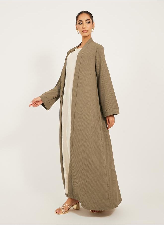 Styli - texture fabric front open abaya with high neck detail - Image 1