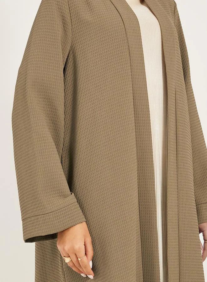 Styli texture fabric front open abaya with high neck detail
