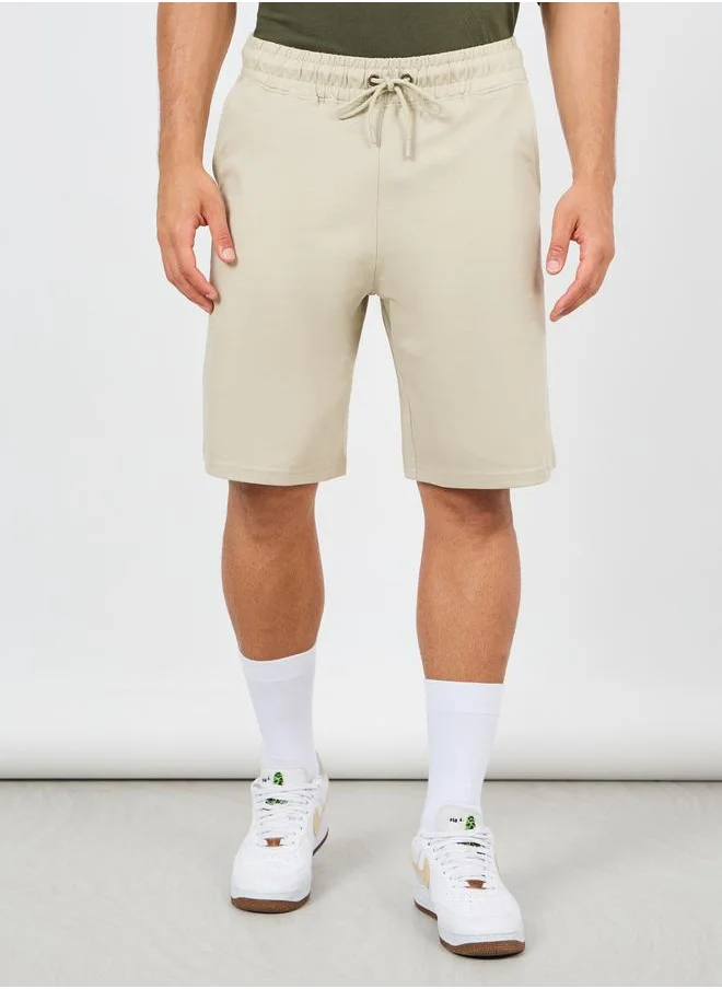 ستايلي Styli Oversized Solid Shorts with Drawstring