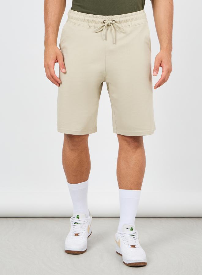 Styli Oversized Solid Shorts with Drawstring - Image 1