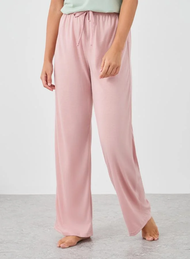 ستايلي Styli Graphic Print Round Neck T-Shirt and Pyjama Set