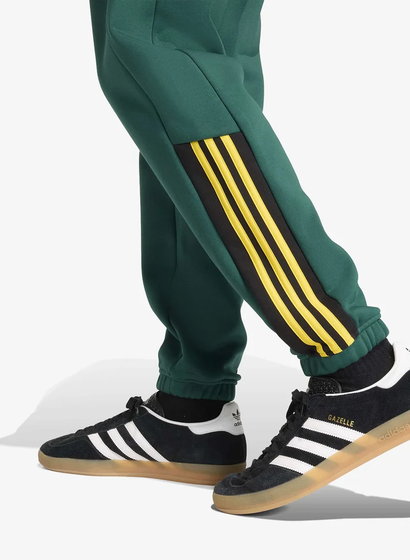 Adidas Originals CGREEN Half Stripes Sweatpants for Men | Best Price UAE