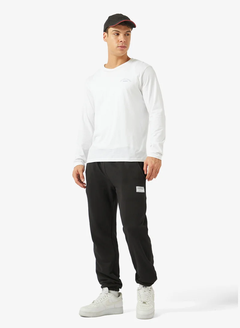 سفنتي فايف بيسيكس Regular Fit- Elastic Cuff- Woven Badge Joggers