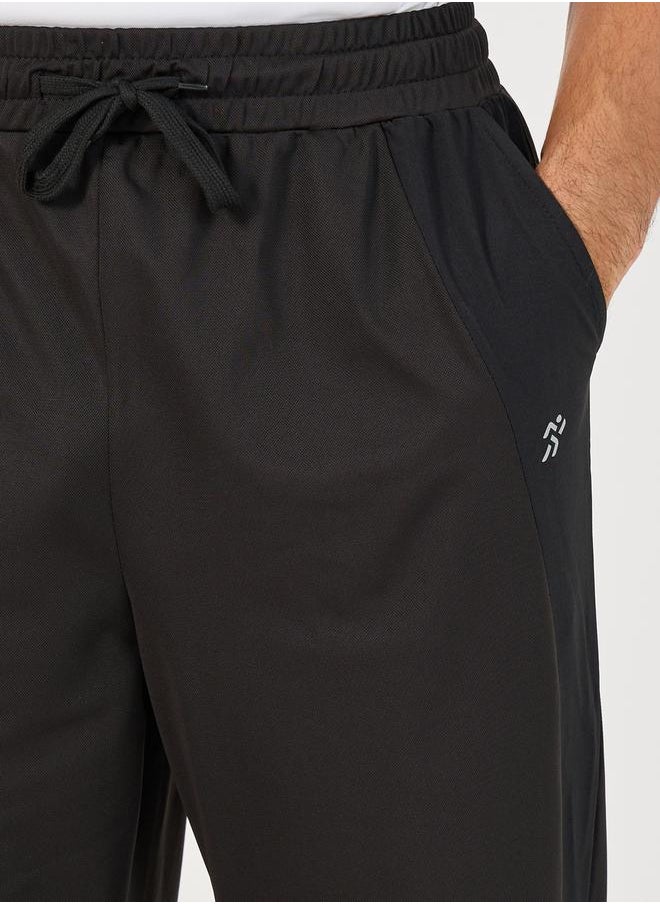 4-Way Stretch Slim Fit Training Track Pants - https://f.nooncdn.com/p/pzsku/ZB82856AC8415CD93BE75Z/45/_/1735287509/7306f4e9-e3b8-4bae-a88f-4247c5a6435a.jpg?width=original