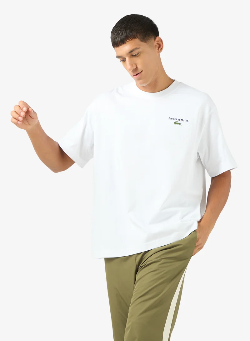 لاكوست تي شيرت بياقة دائرية بقصة واسعة