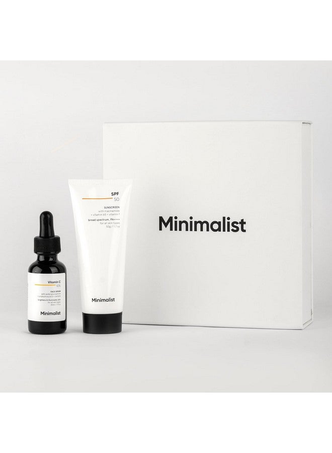 منيماليست مجموعة هدايا للعناية بالبشرة بتفتيح البشرة وعامل حماية من الشمس | مجموعة هدايا فاخرة للنساء والرجال | سيروم وواقي شمس  - Image 1