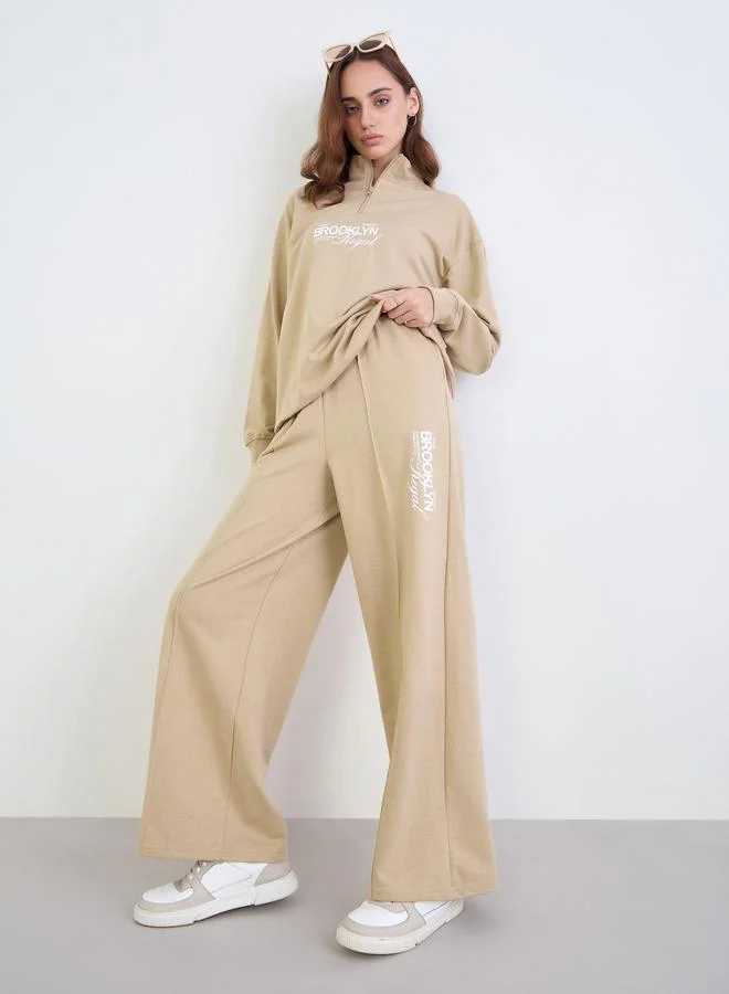 Styli Styli Relaxed Fit Printed Sweatshirt and Wide Joggers Co-Ords