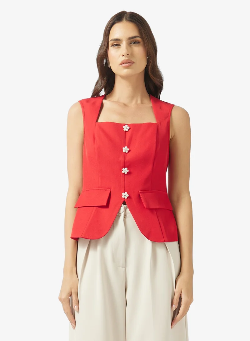 ايلا بلوزة بدون أكمام