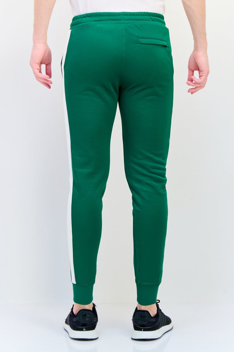 PUMA Men Slim Fit T7 Iconic Training Track Pants, Green - Image 3
