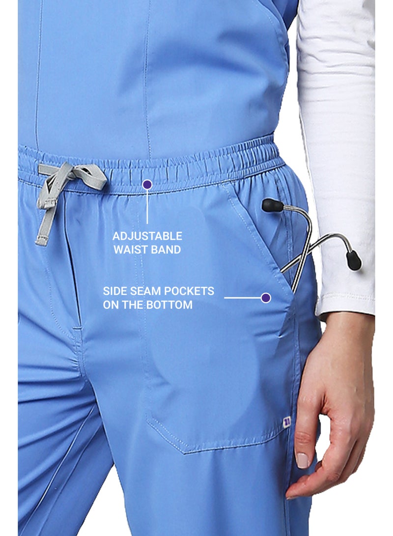 KNYA زيّ طبي نسائي كلاسيكي من KNYA بخمسة جيوب | ياقة على شكل حرف V | تصميم مرن ومريح للجزء العلوي والسفلي | جيوب يسهل الوصول إليها | زيّ موحد للأطباء | أزرق سماوي (مقاس متوسط) - Image 4