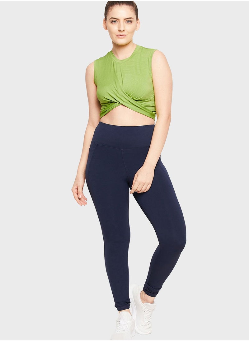 Clovia Comfort-Fit Front Knot Active Crop Top in Pista Green  - Image 5