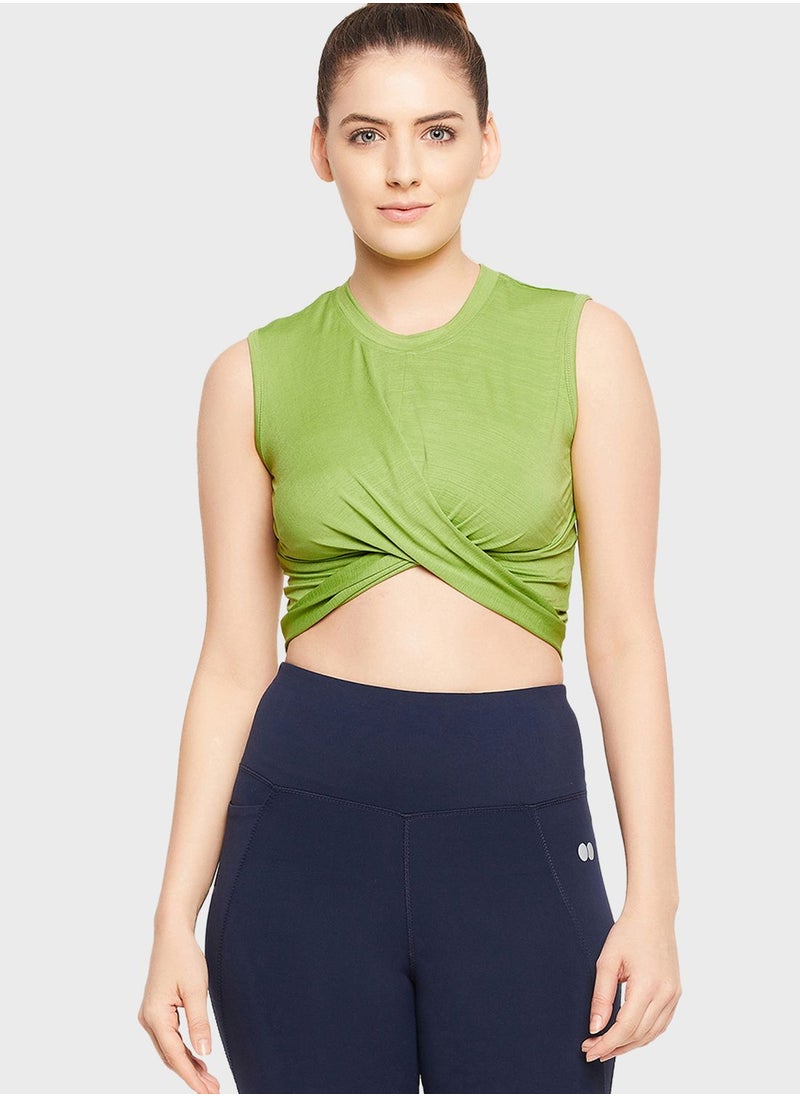Clovia Comfort-Fit Front Knot Active Crop Top in Pista Green  - Image 1