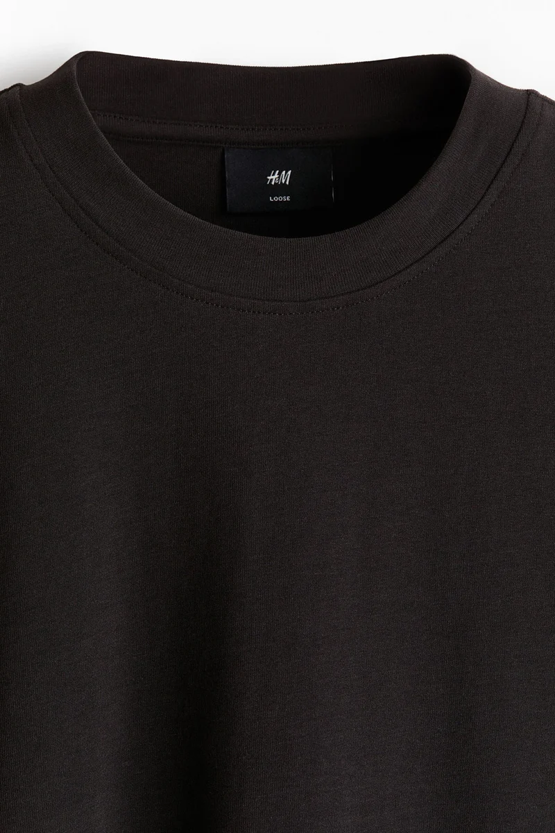 اتش اند ام تي-شيرت بقصة واسعة وتصميم بوكسي