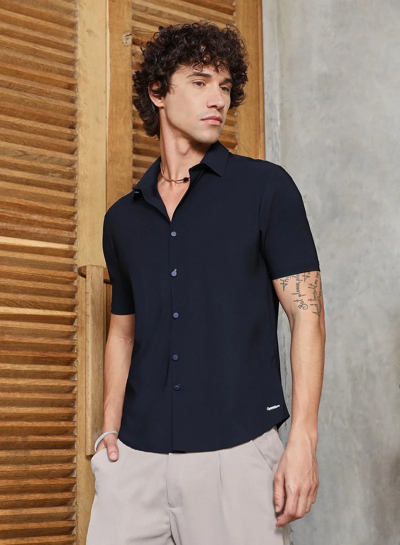 Campus Sutra Men's Prussian Blue Seamless Waffle Shirt