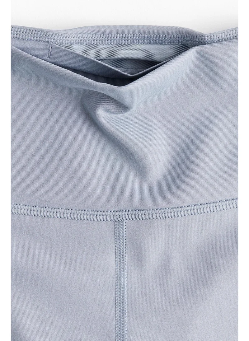 H&M Pocket-detail sports leggings in DryMove™