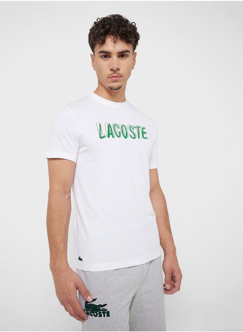 LACOSTE Logo Graphic Crew Neck Short Sleeve T-Shirt  - Image 1