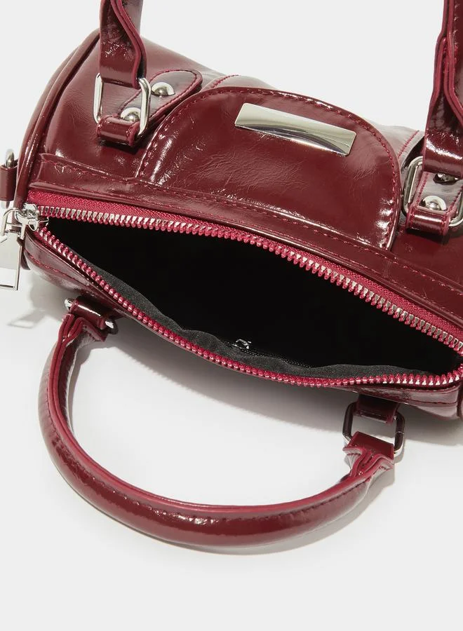 Styli  Burgundy Patent Studded Hand Bag for Women | Best Price UAE