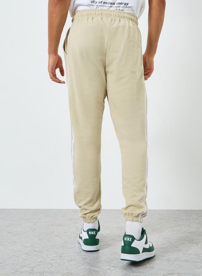 Styli Men Slim Fit Terry Joggers with Side Taping - Image 4