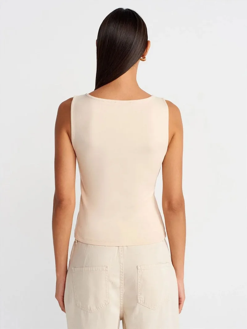 ديلفين Dilvin Sleeveless Slim-Fit Jersey Blouse With Zip