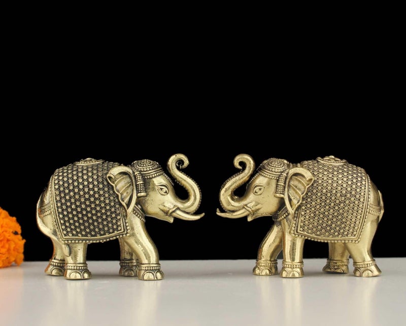 INDICAST Brass 2" Elephant Statue 2 pcs Set Decorative Showpiece Figurines for Home Office & Gift Article | Perfect for Home Dcor & Good Luck (Weight- 80gm) - Image 1
