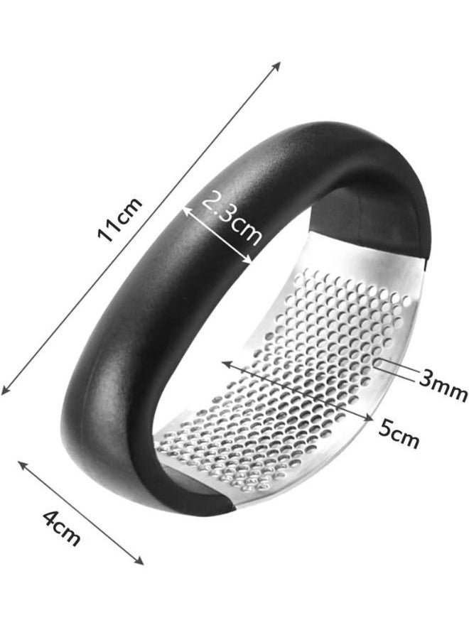 Generic - A kitchen tool for chopping and mashing garlic - Image 1