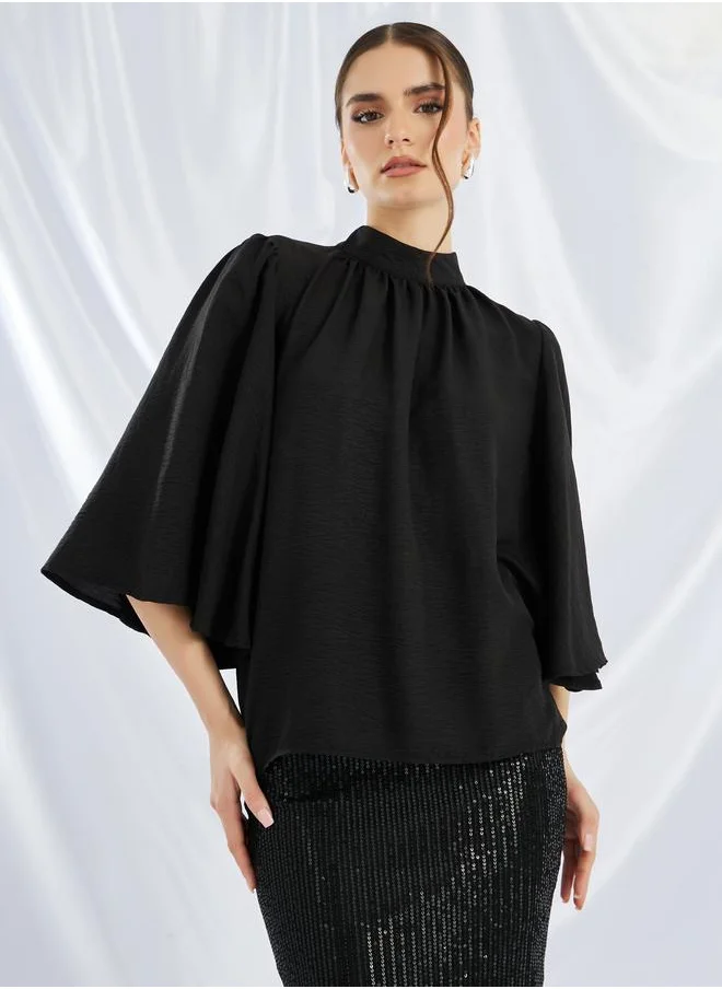 ستايلي Styli Solid High Neck Top and Sequin Embellished Skirt Co-Ords