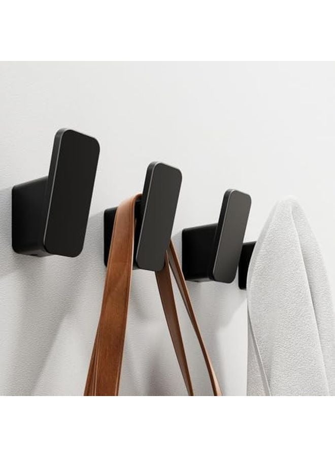 الخطافات السوداء ذاتية اللصق للحائط، 4 قطع، للمناشف والمعاطف وتنظيم الحمام والمنزل - Image 1
