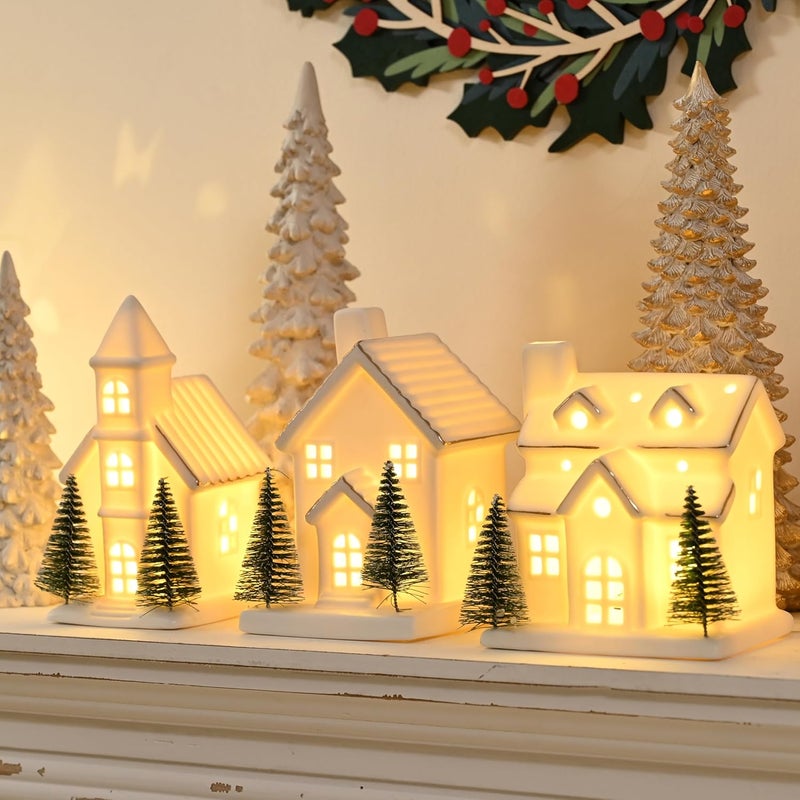 AOMOONOA Ceramic White Christmas Village Houses, 3Pcs Light Up Small Porcelain Village House with 6Pcs Christmas Trees, LED Lighted Tabletop House Figurines for Home Decor, Winter Holiday DIY, Gift - Image 1