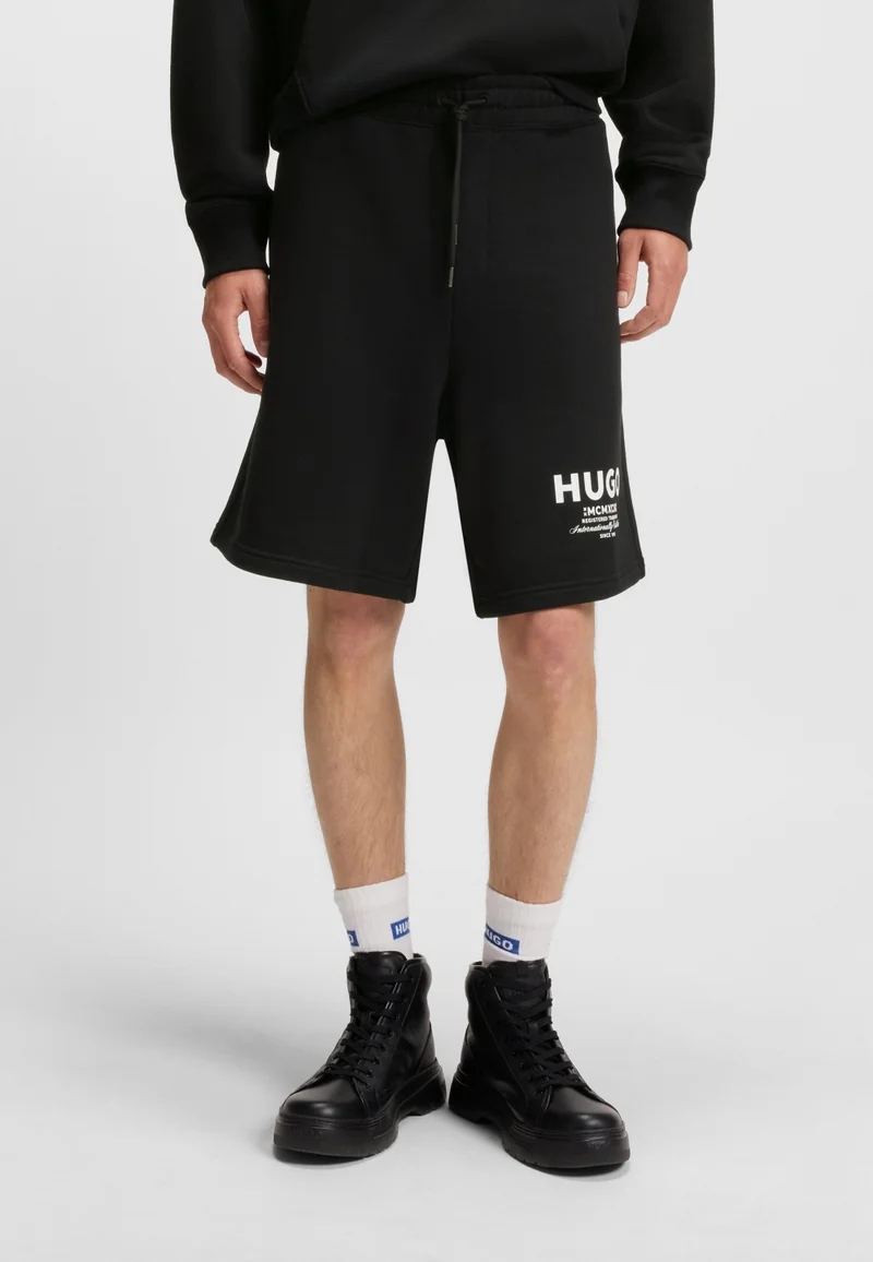HUGO Loose-fit shorts in cotton terry with logo print