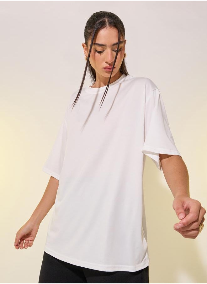 Styli - Women White Back Graphic Print Oversized T-Shirt - Image 1