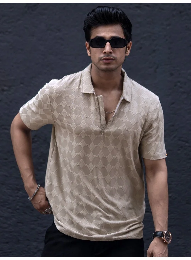 مانياك تيشيرت رجالي بياقة بولو مضلع بأكمام ثلاثة أرباع وسحاب نصفي من مزيج القطن والليكرا بيج