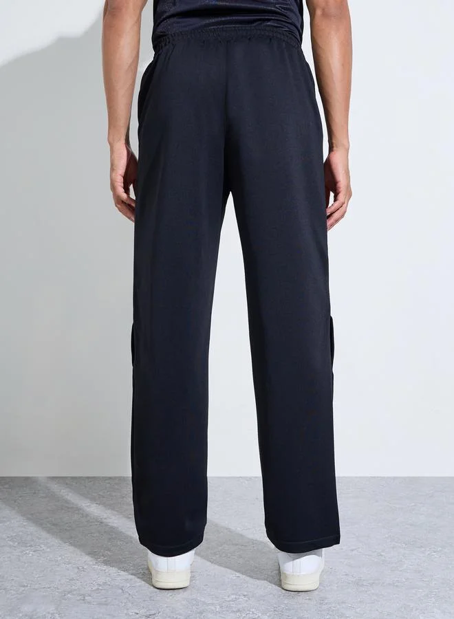 Take Two  Men Black Solid Drawstring Knit Pants with Button Hem for Men | Best Price UAE
