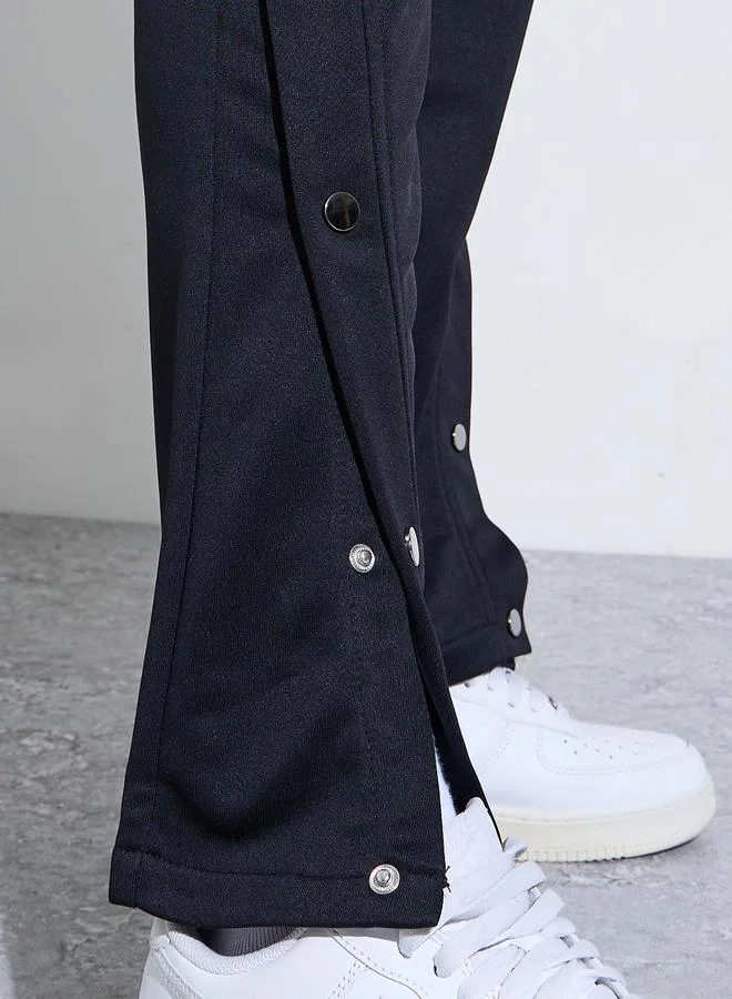 Take Two  Men Black Solid Drawstring Knit Pants with Button Hem for Men | Best Price UAE
