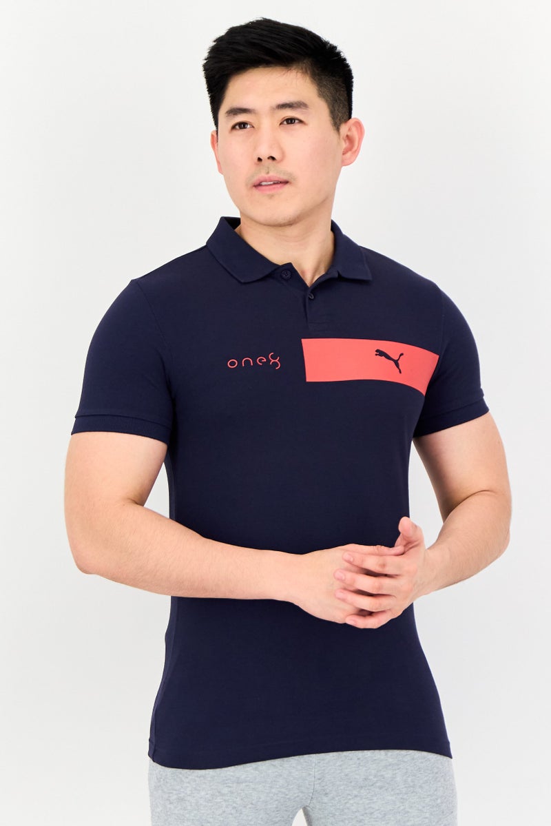 PUMA One8 Men Slim Fit Brand Logo Short Sleeves Outdoor Polo Shirt, Navy - Image 1