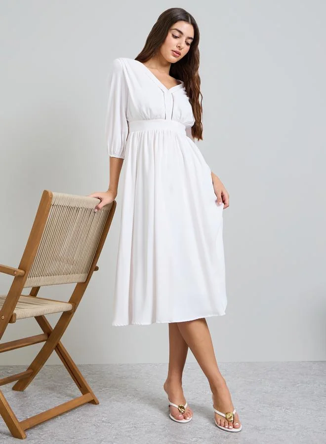 ستايلي White Solid 3/4 Sleeves A-Line Midi Dress