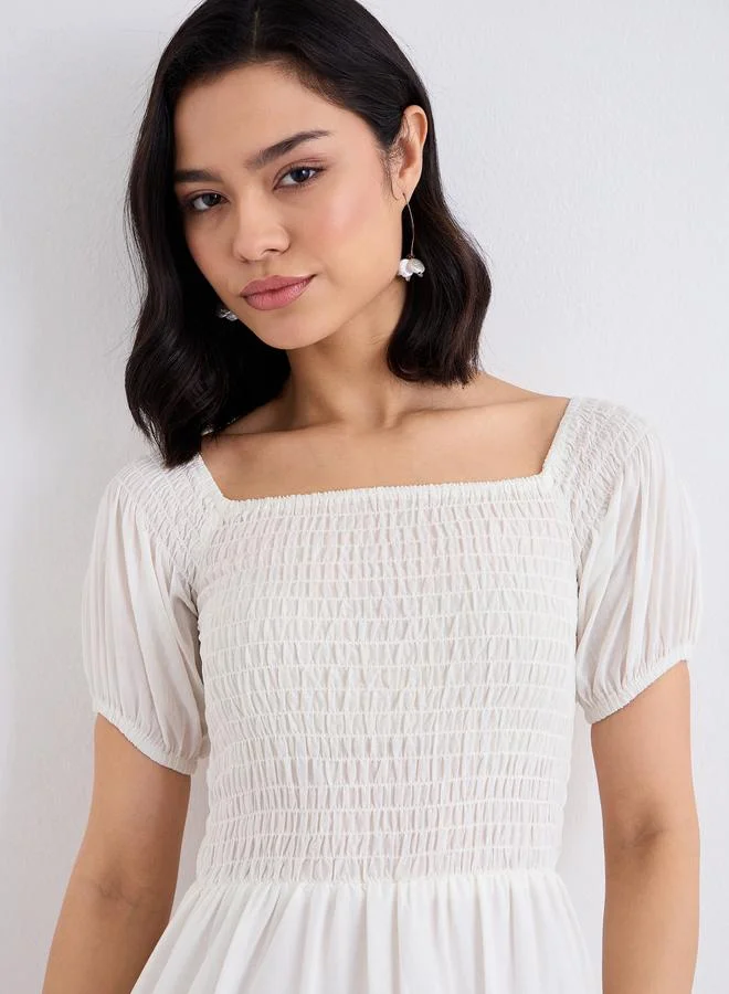 Styli Styli Cream Embroidered Hem Maxi Dress
