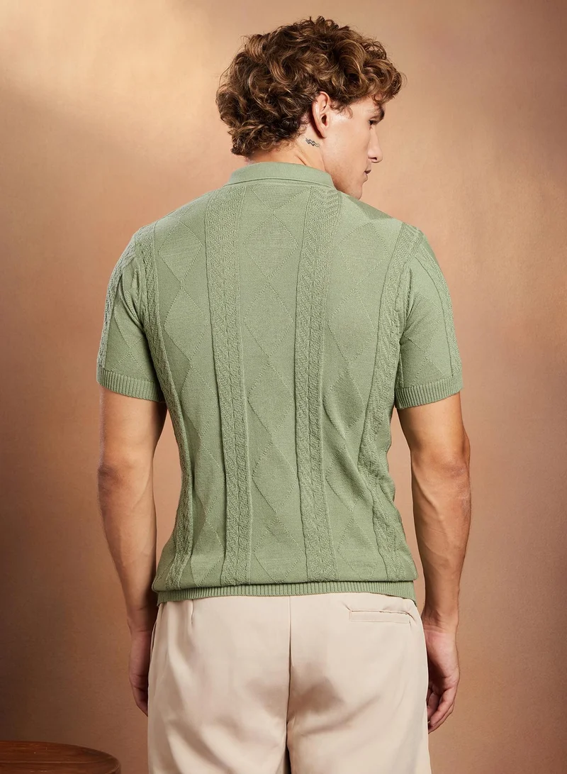 Campus Sutra Campus Sutra Men's Pistachio Green Argyle-Tactile Polo T-Shirt For Casual Wear | Polo Neck | Short Regular Sleeves | Half-Button Closure | T-Shirt Crafted With Comfort Fit For Everyday Wear