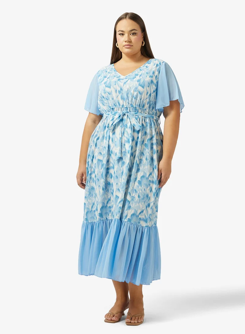 جينجر بلس فستان  لاين بنقشة الزهور وأكمام مكشكشة