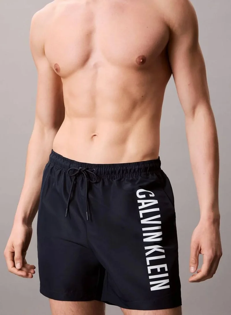 Calvin Klein Jeans Dark Sapphire Medium Drawstring Swim Shorts - Intense Power for Men | Best Price UAE