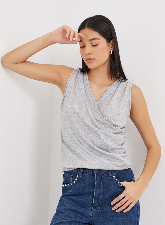 ستايلي بلوزة تريكو بدون أكمام بياقة على شكل حرف - Image 1