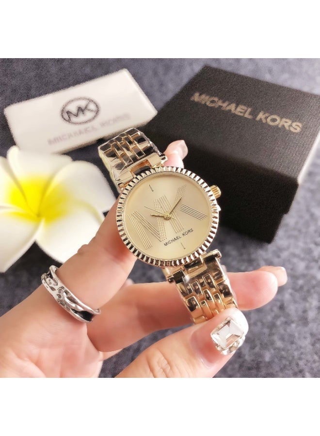 ام كي Michael Kors Women's Gold - Tone Watch with Signature Logo Dial and Stainless Steel Bracelet